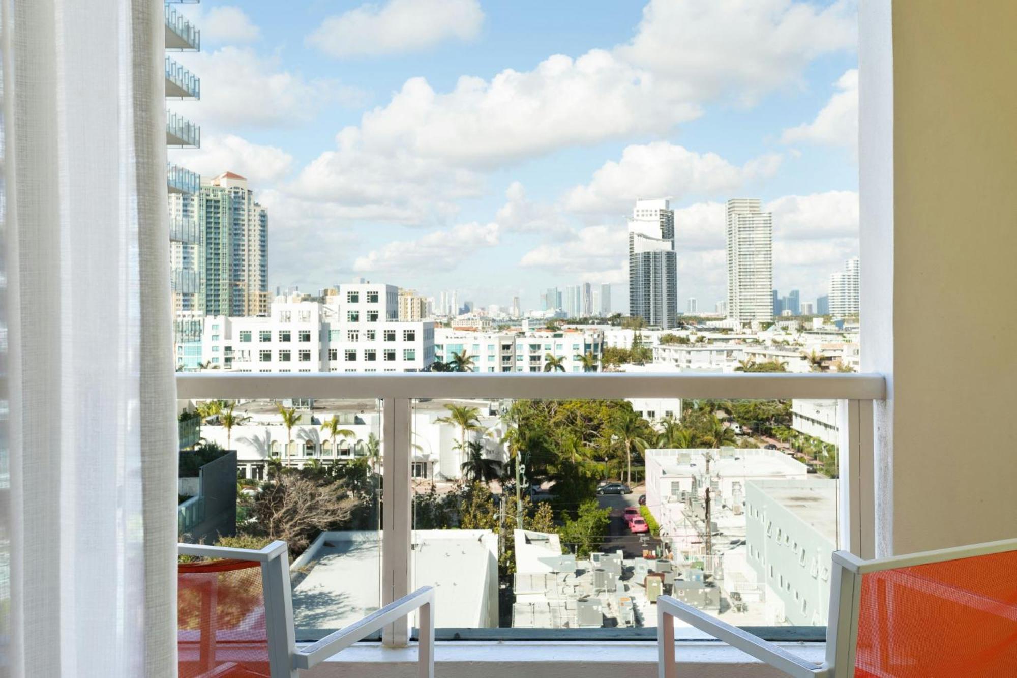 Two Double Beds Room with City View and Balcony