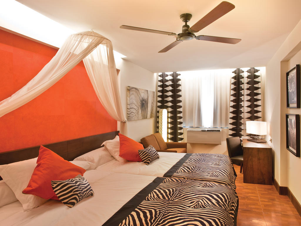 Chambre Double (2 Adultes + 2 Enfants) - Vue Partielle sur Mer